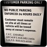 tow away parking sign